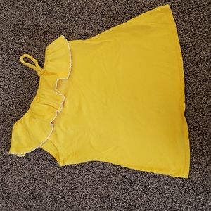 2 items: Arizona yellow top with off sleeve shoulder and Justice Dance shirt
